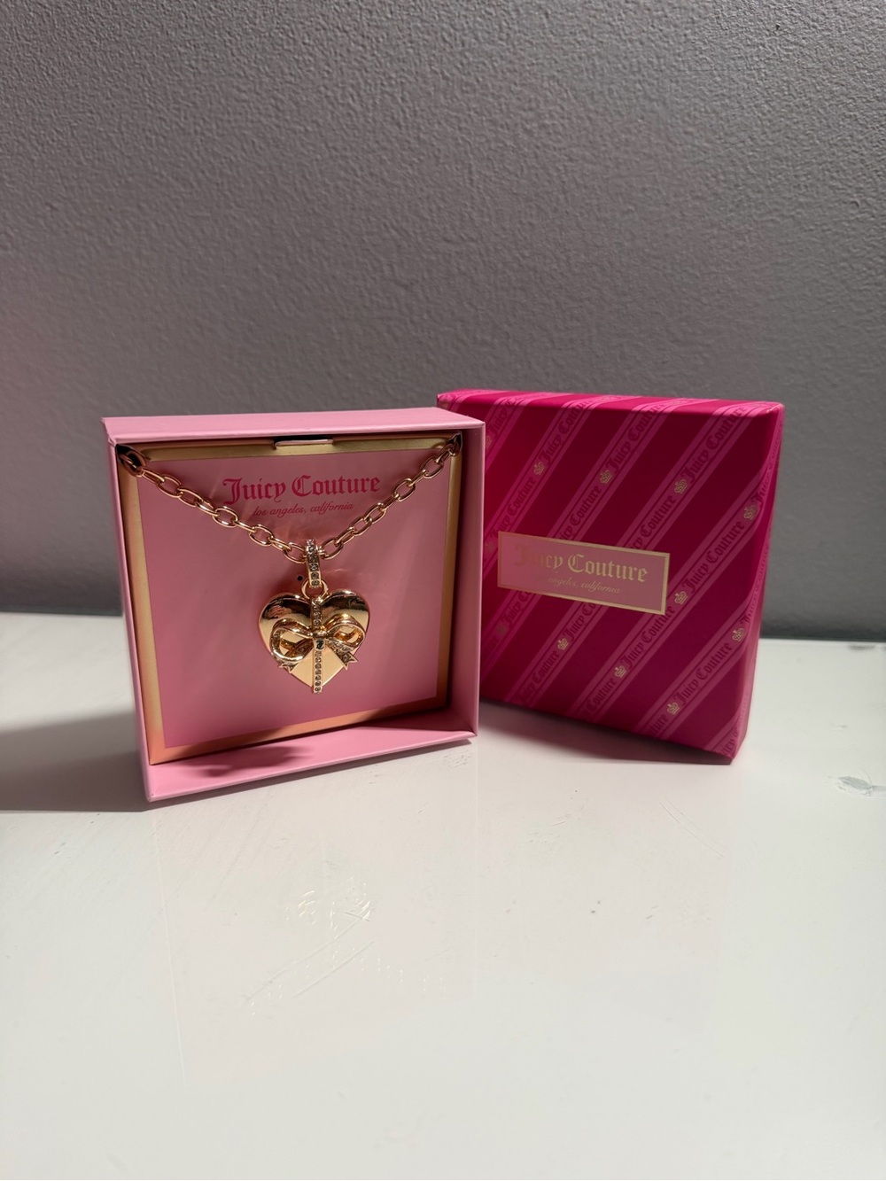 Juicy Couture necklace with heart pendant